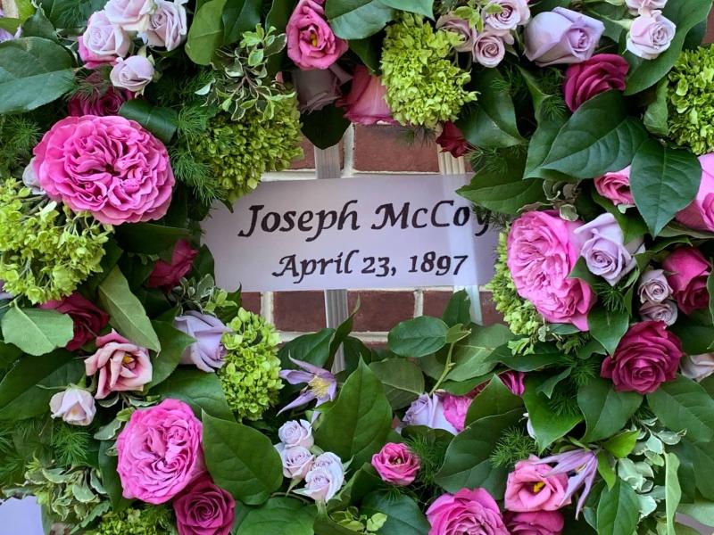 Wreath in memory of Joseph McCoy, lynched in 1897 (2021)